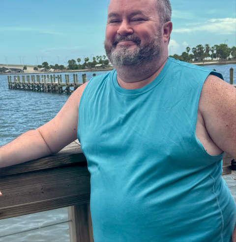 Laughing at his own humor