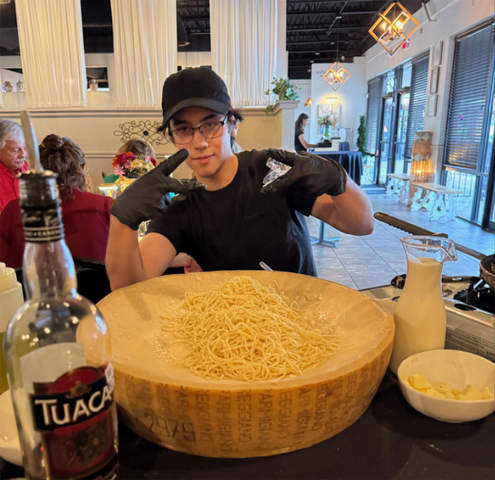 Fun Guy Making the Pasta for us